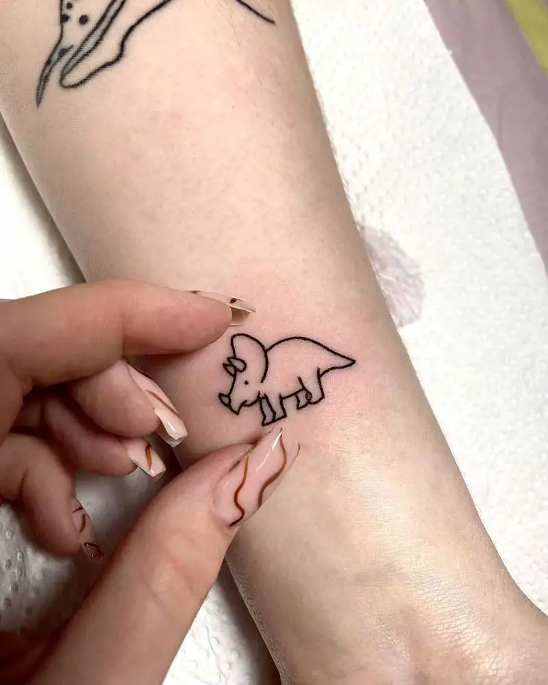 minimalist-small-dinosaur-tattoo-1