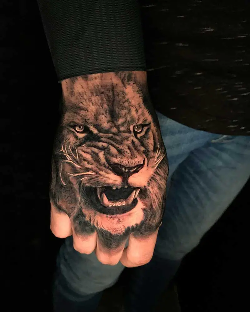 realistic-lion-hand-tattoo-3