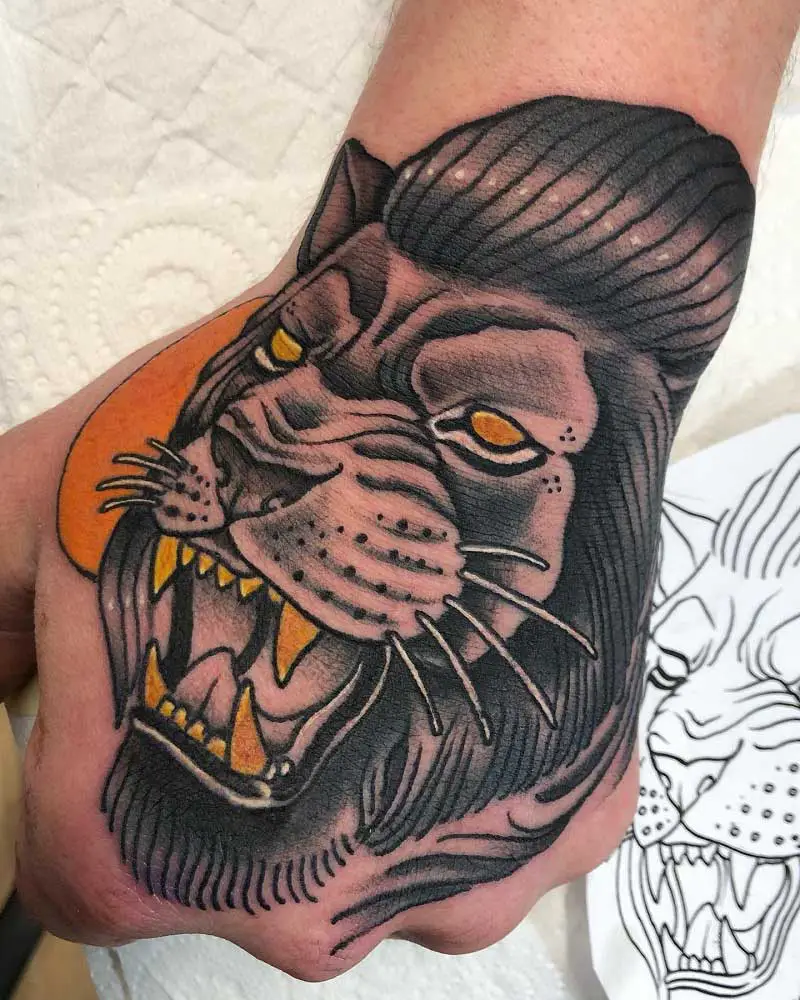 traditional-lion-hand-tattoo-2
