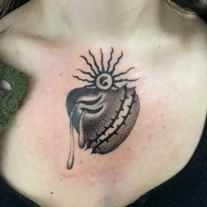 evil-sacred-heart-tattoo-designs-2