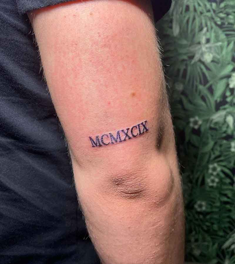 1999 Roman Numerals Tattoo 1