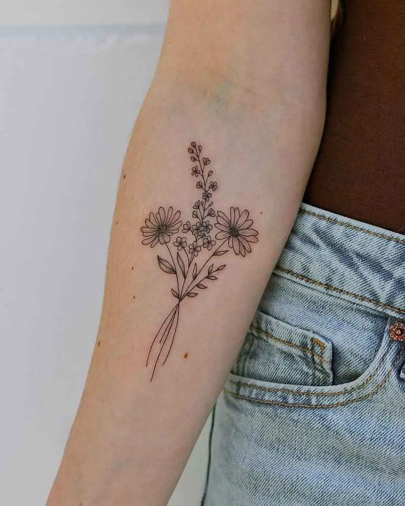 Fine Line Birth Flower Tattoo 1