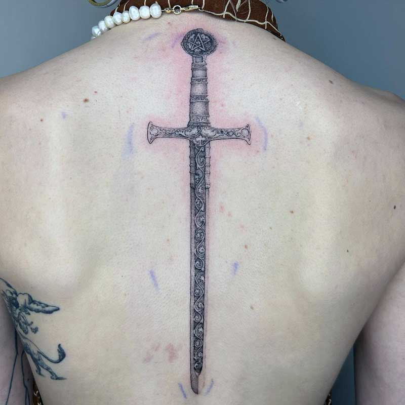 spine-tattoos-for-men-sword-1