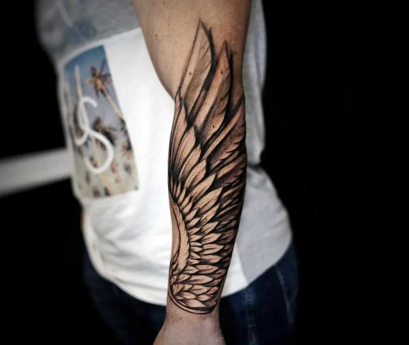 forearm-wing-tattoos-for-guys-3