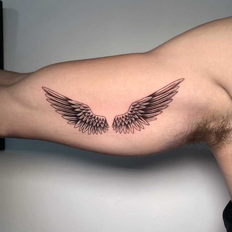 inner-forearm-wing-tattoo-2